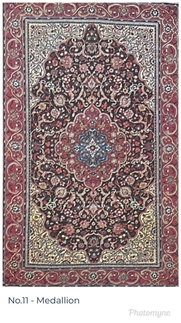 A rug with a floral design in red, blue and beige.
