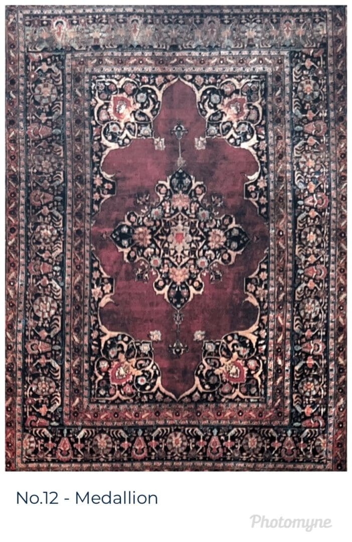 A large rug with an oriental design in shades of red and black.