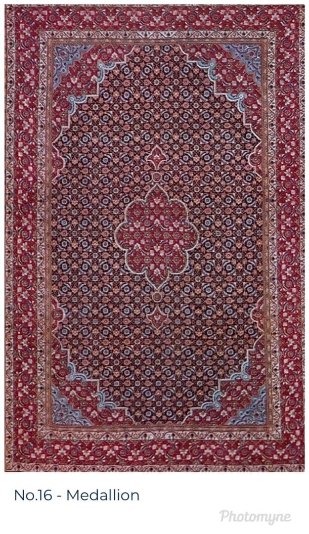 A large rug with a floral design in shades of red and blue.