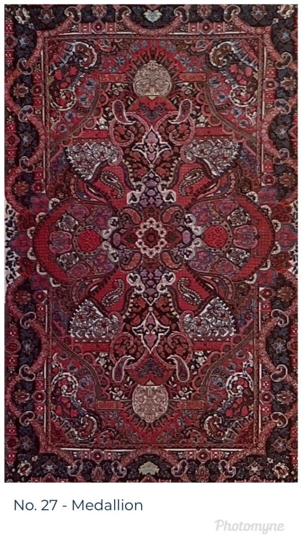 A red rug with an intricate design on it.