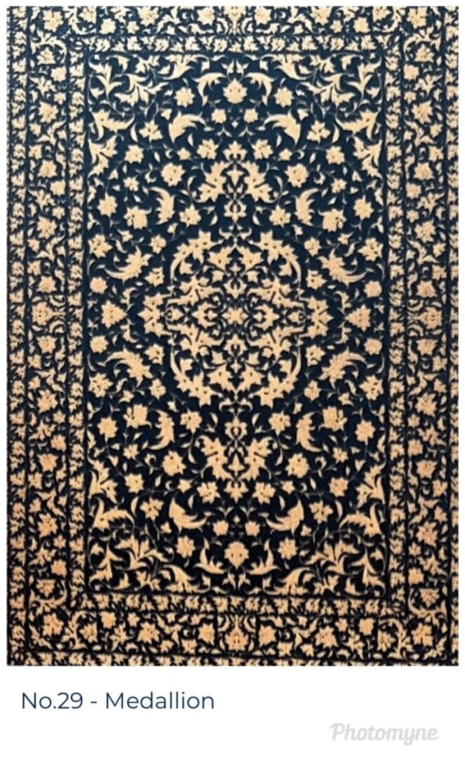A black and beige rug with floral design.