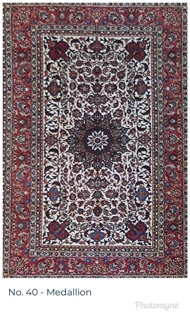 A rug with a floral design in red and blue.