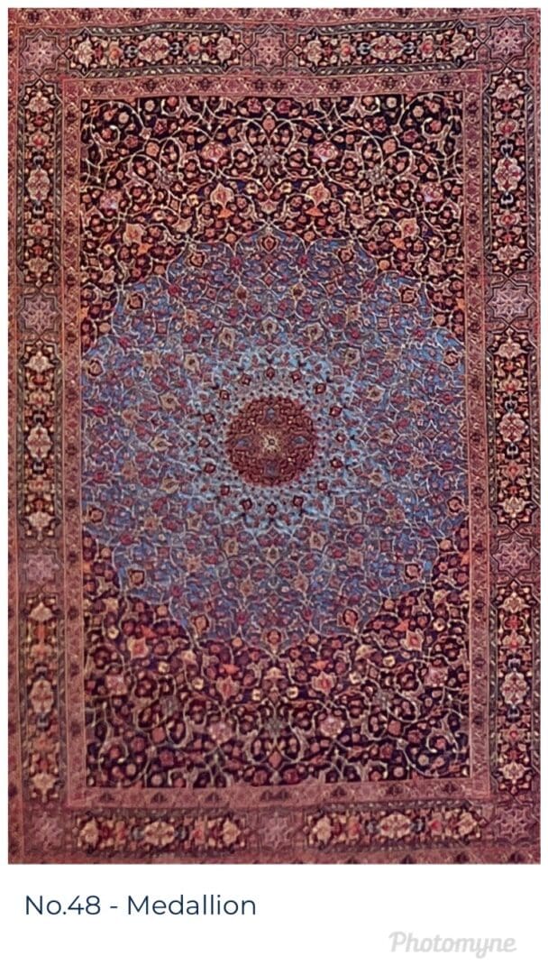 A large oriental rug with a floral design.