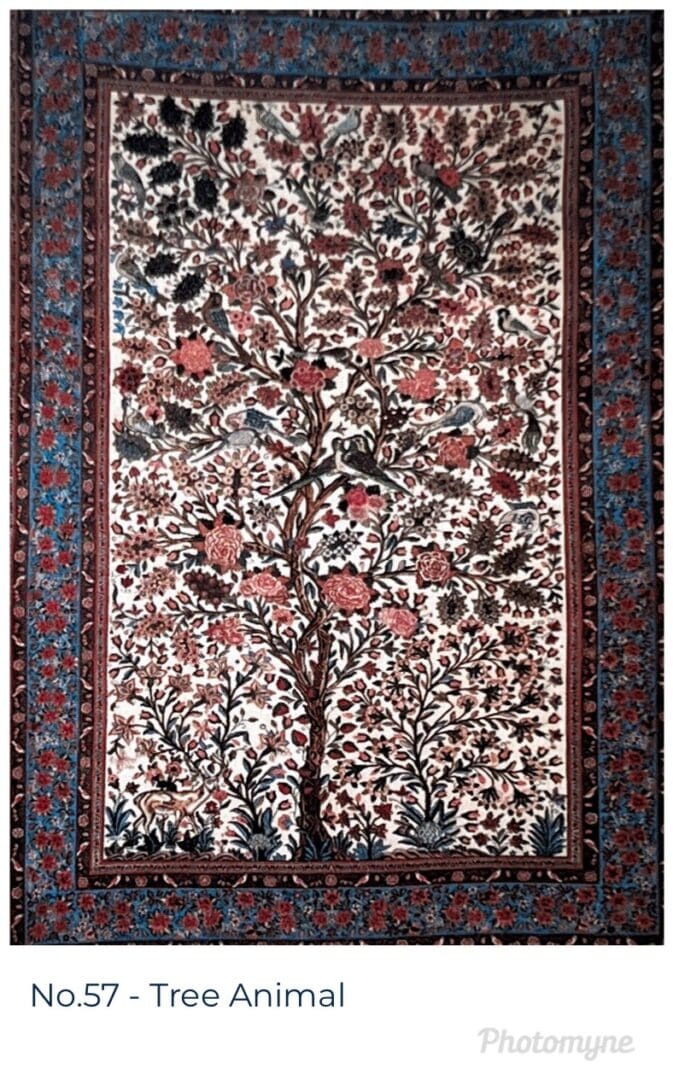 A tree of life tapestry with flowers and birds.