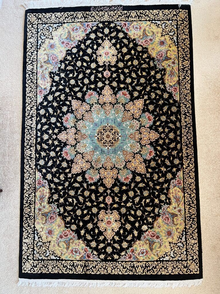 A rug with a floral design on it.